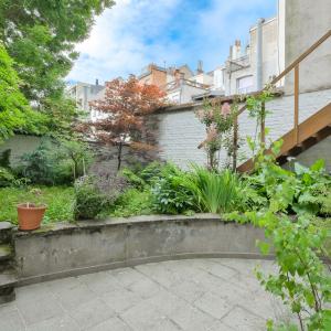 Quartier EU - Magnifique duplex avec jardin & garage