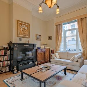 Place Brugmann : maison 6 ch + jardin orienté Sud