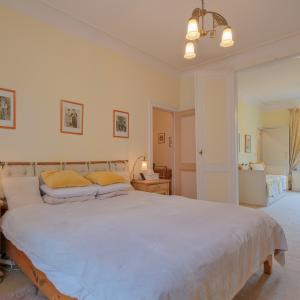Place Brugmann : maison 6 ch + jardin orienté Sud
