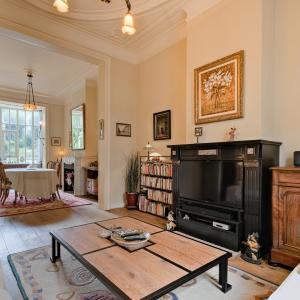 Place Brugmann : maison 6 ch + jardin orienté Sud