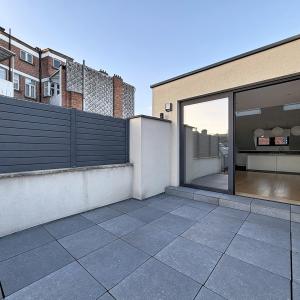 Pl. Brugmann : Superbe duplex penthouse rénové