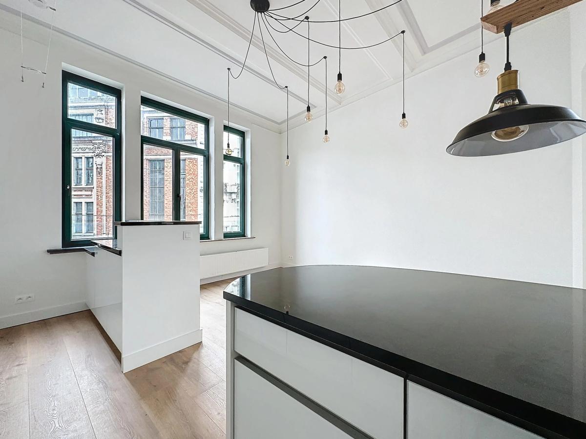 Sablon : Sublime appartement triplex penthouse remis à neuf