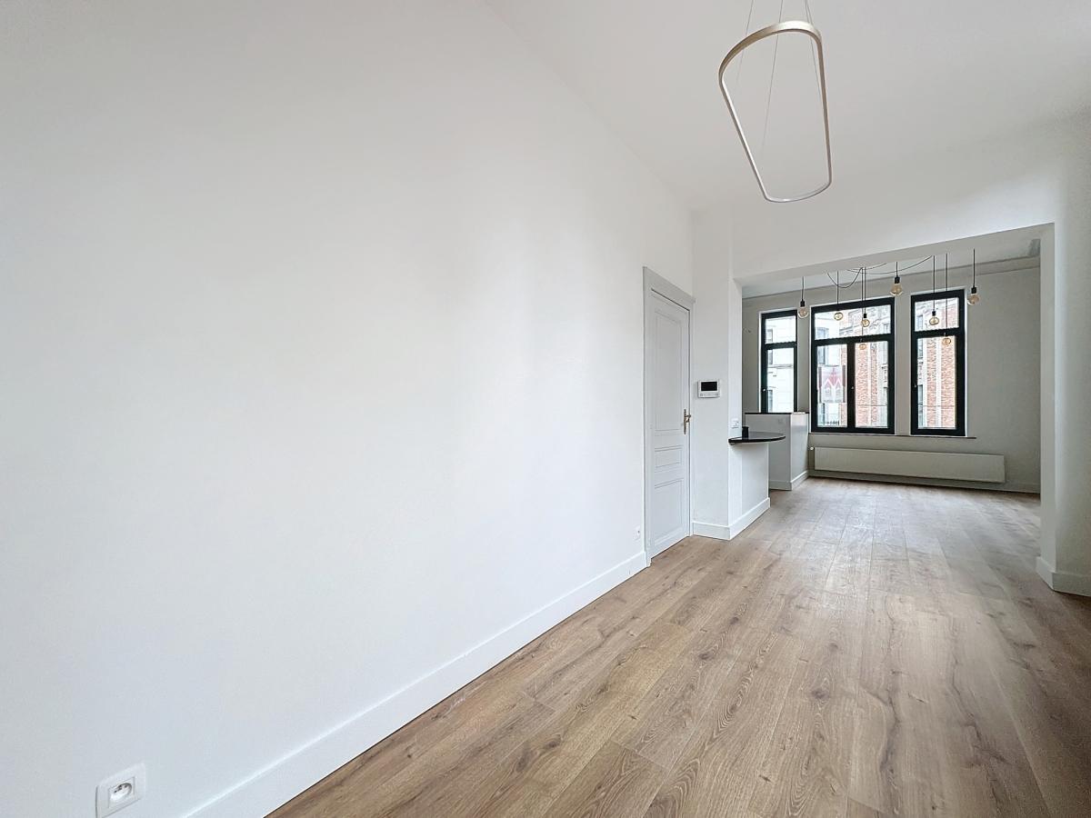 Sablon : Sublime appartement triplex penthouse remis à neuf