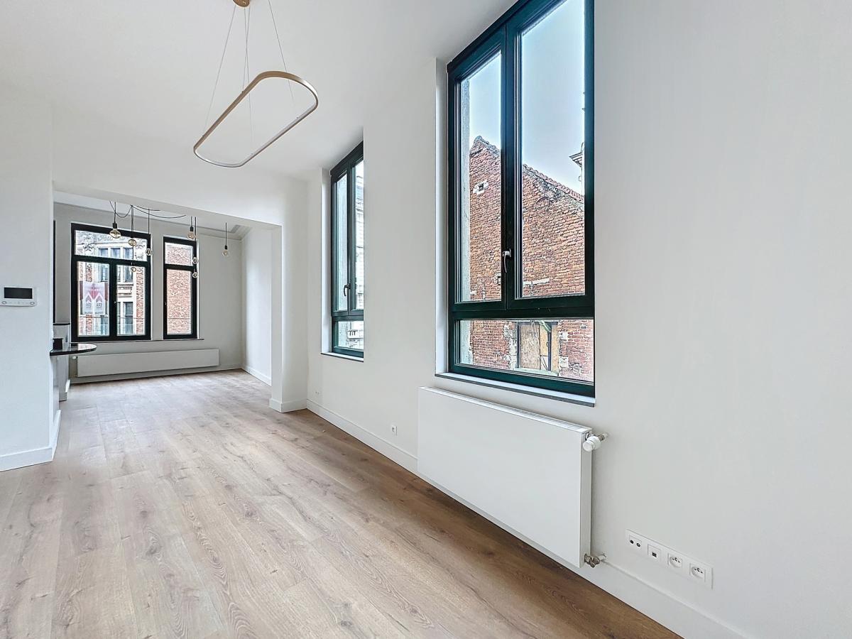 Sablon : Sublime appartement triplex penthouse remis à neuf