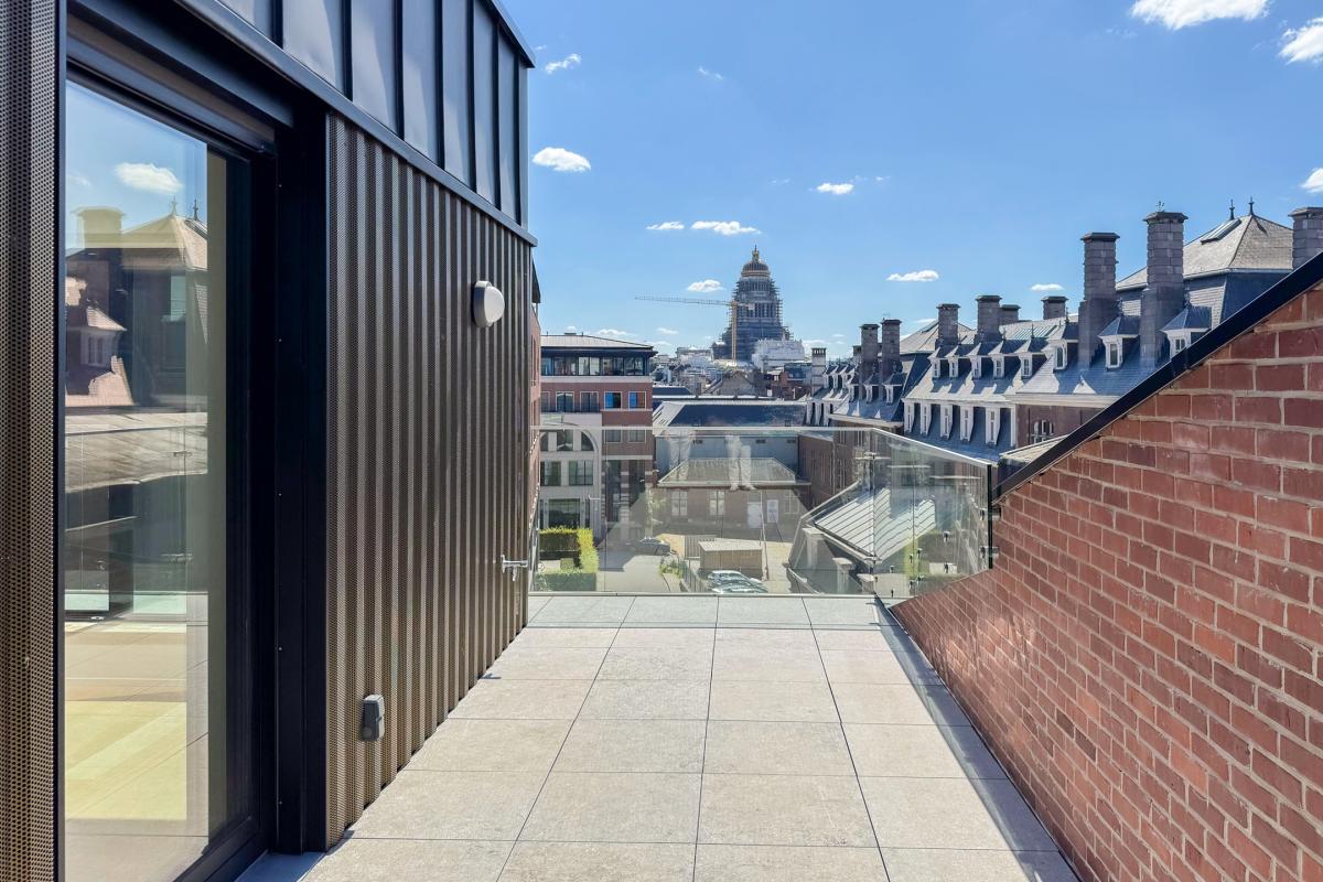 Penthouse neuf +- 204m² 3ch. + terrasse