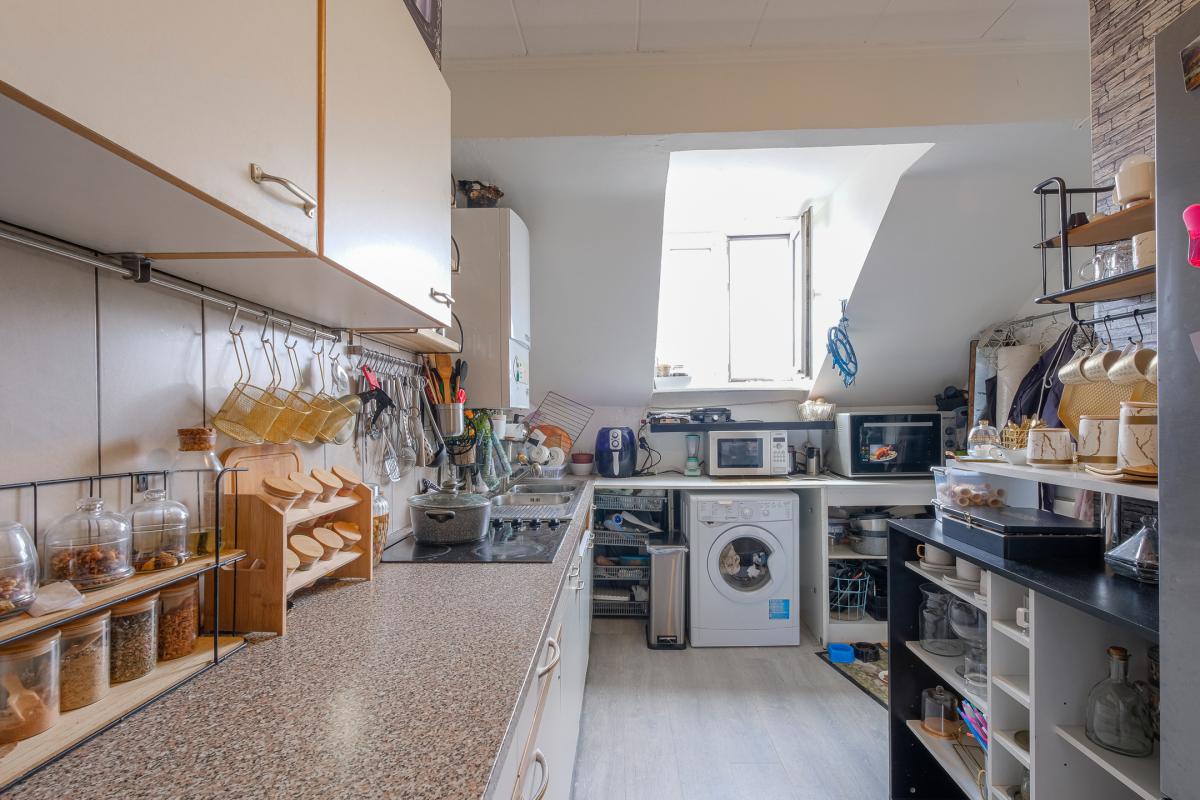 Maison à rafraîchir de ± 235 m² bruts, avec cour intérieure.