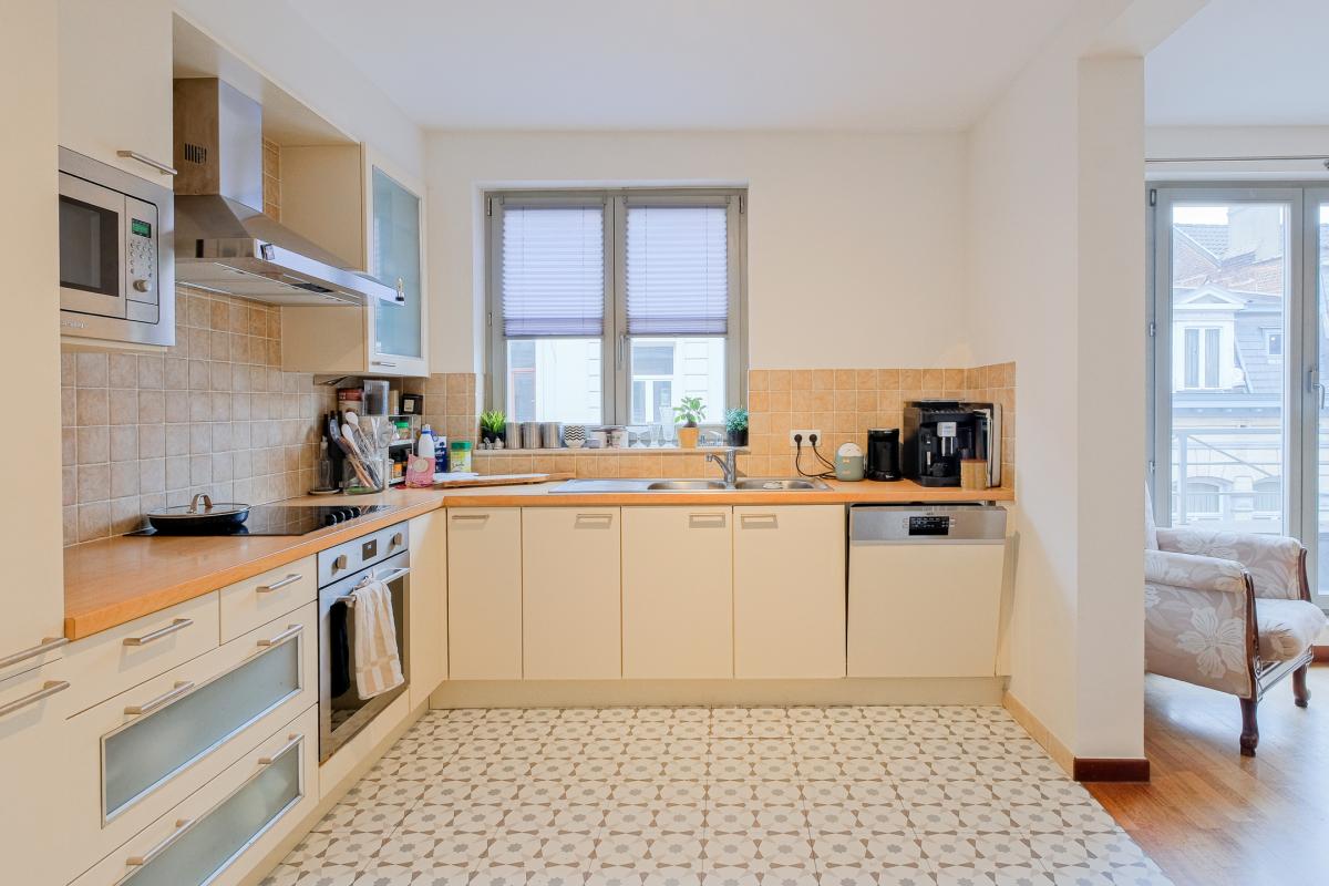 SOUS OFFRE ! Châtelain : Bel appartement 2 chambres + terrasse + parking