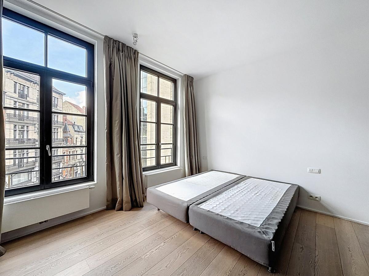 Sablon : Superbe appartement rénové, immeuble de caractère