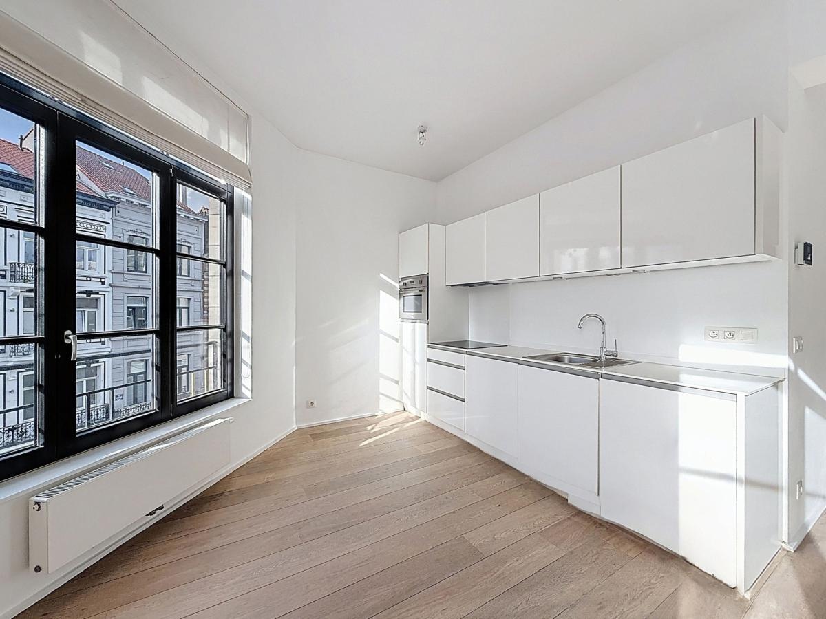 Sablon : Superbe appartement rénové, immeuble de caractère