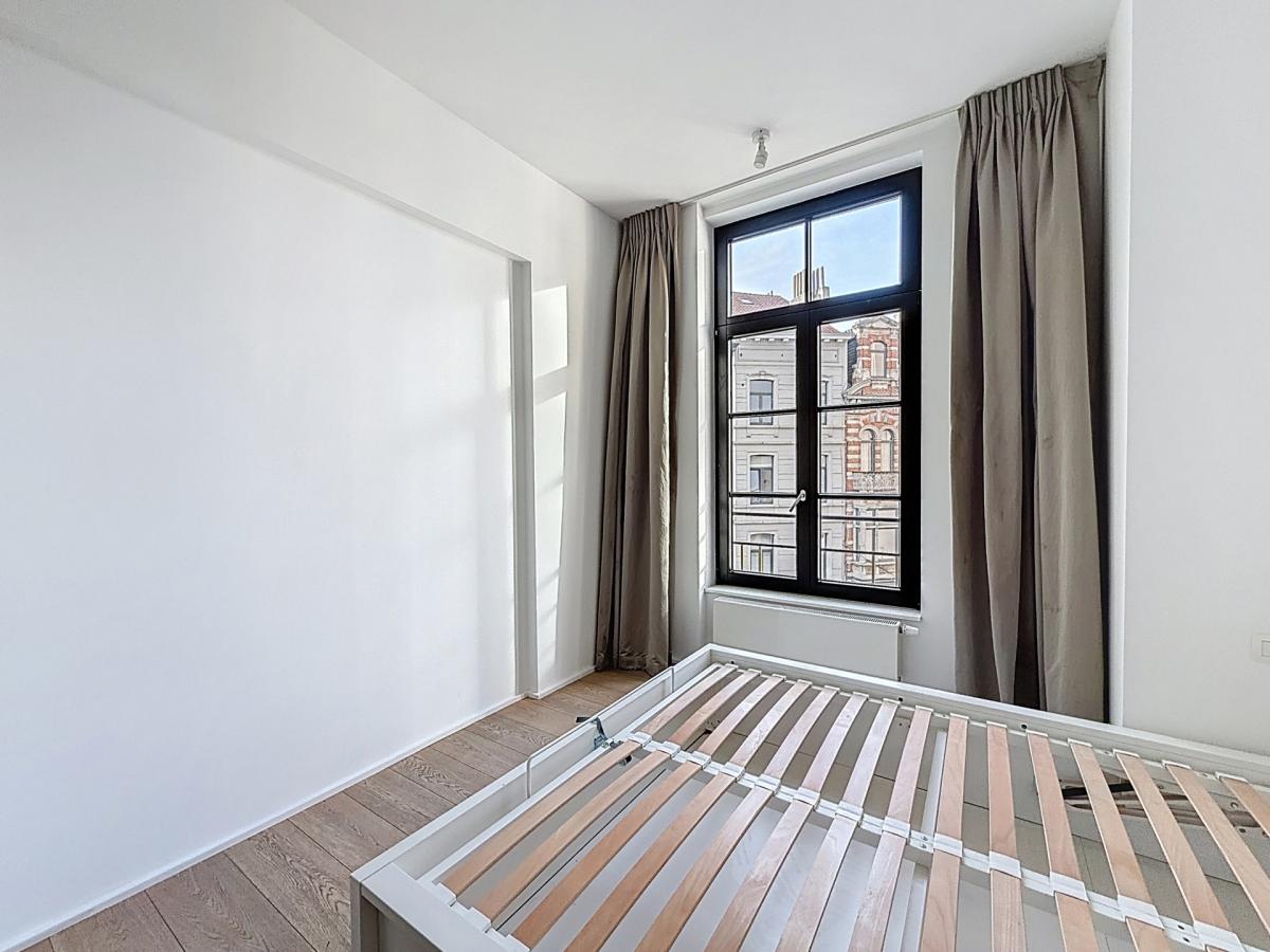 Sablon : Superbe appartement rénové, immeuble de caractère