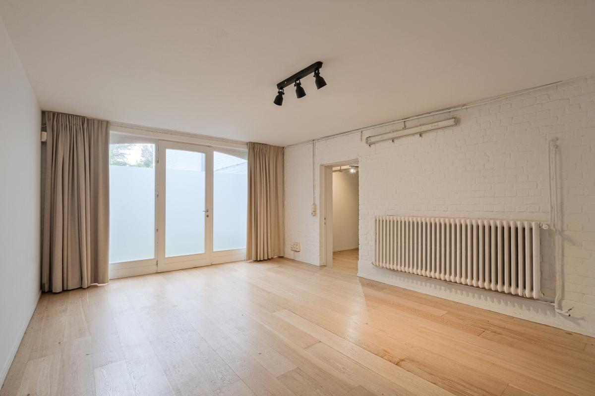 Leo Errera - Villa de 670 m² bruts, jardin & prof. libérale.