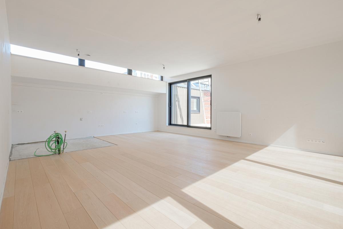 Penthouse neuf +- 204m² 3ch. + terrasse