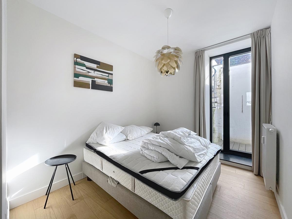 Châtelain/Stéphanie : Triplex meublé 3 chambres avec jardin 