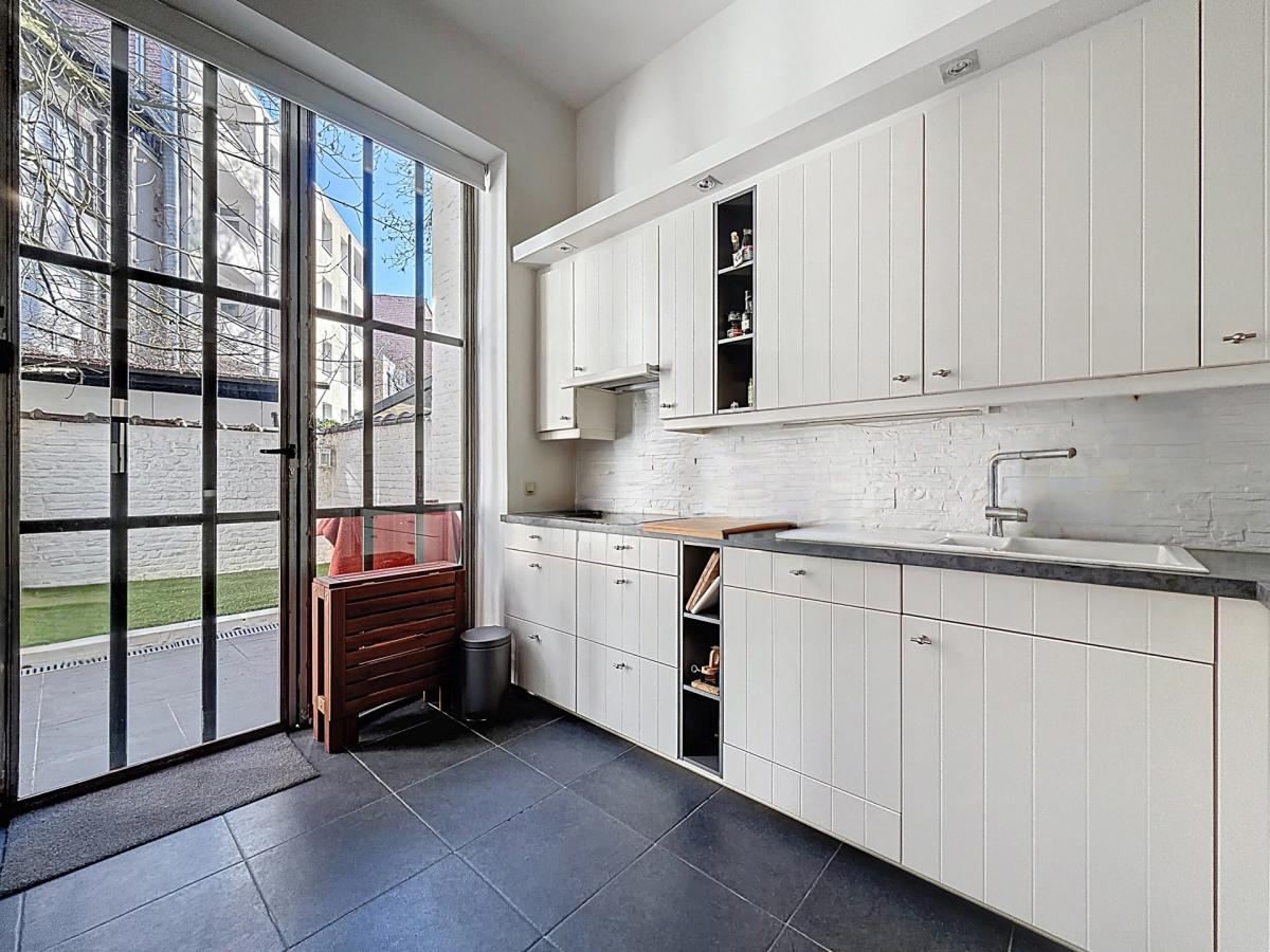 Chatelain : Beau rez-de-chaussée avec jardin !