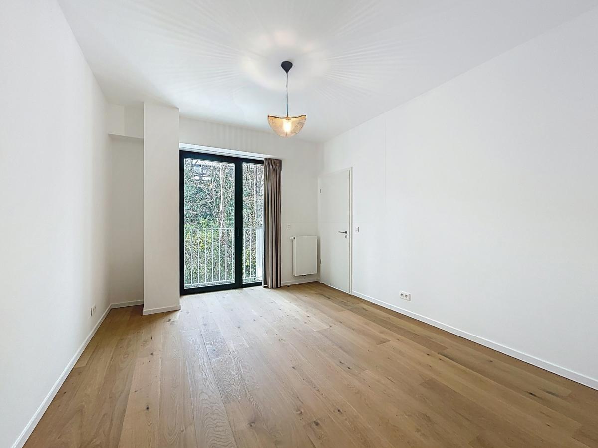 Immeuble The W : Appartement neuf 1ch près UCL avec terrasse