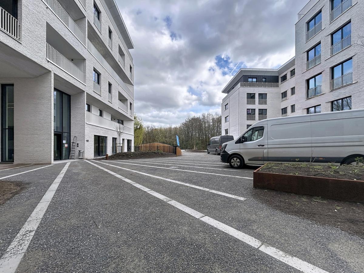 Immeuble The W : Appartement neuf 1ch près UCL avec terrasse