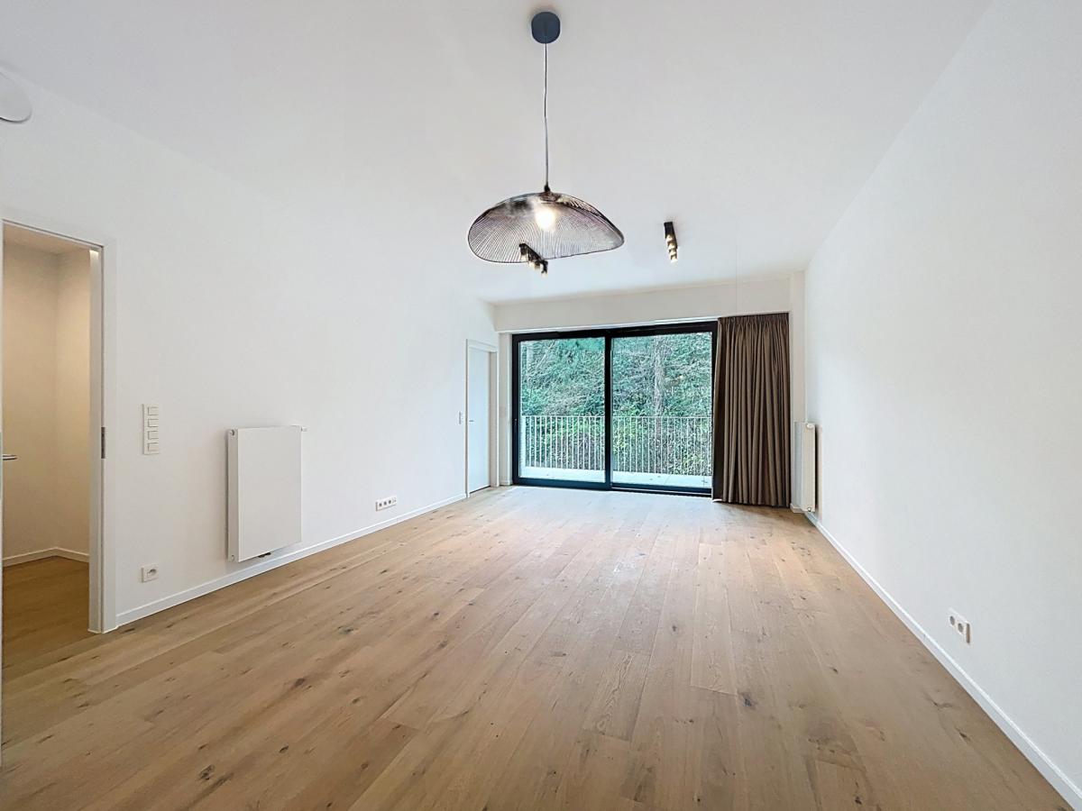 Immeuble The W : Appartement neuf 1ch près UCL avec terrasse