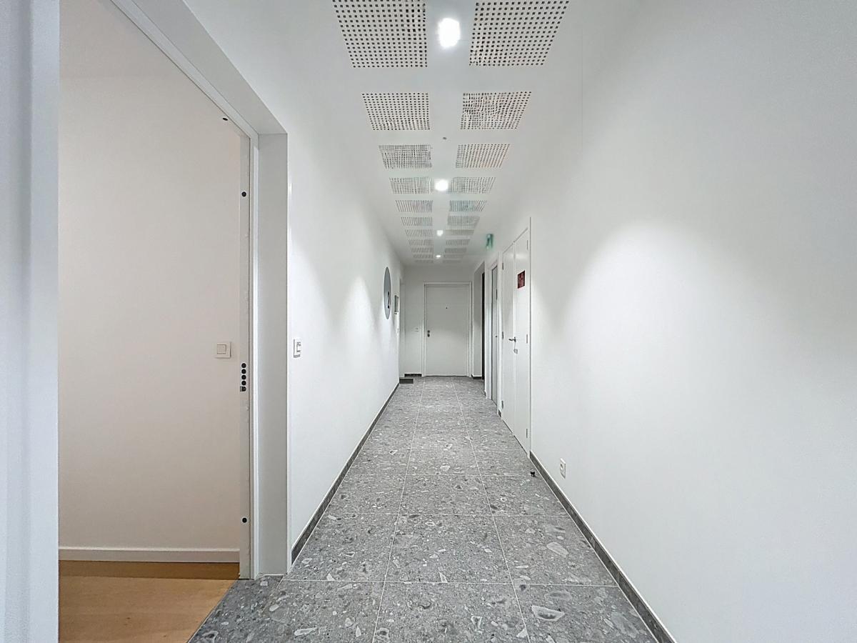 Immeuble The W : Appartement neuf 1ch près UCL avec terrasse