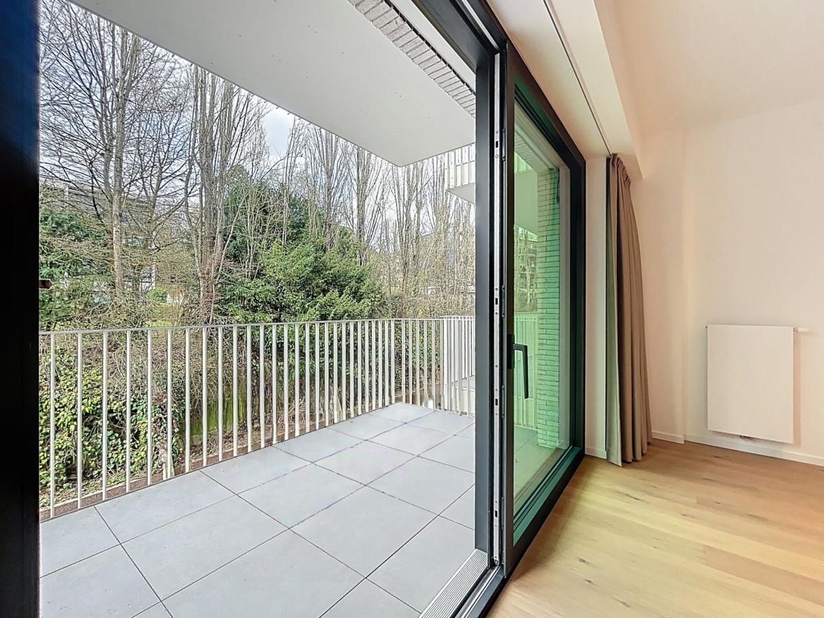 Immeuble The W : Appartement neuf 1ch près UCL avec terrasse