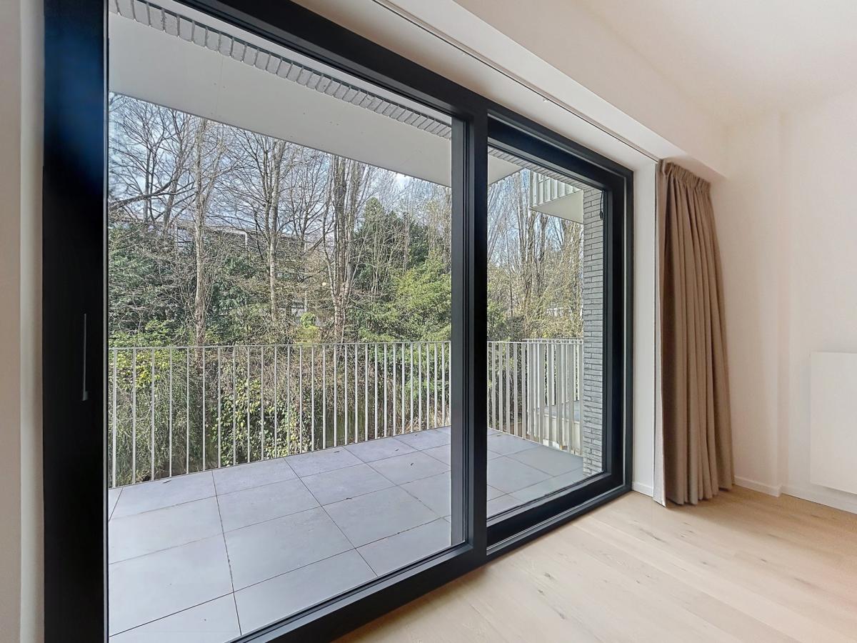 Immeuble The W : Appartement neuf 1ch près UCL avec terrasse