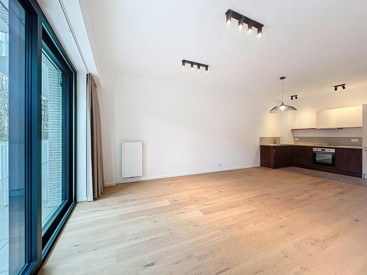 Immeuble The W : Appartement neuf 1ch près UCL avec terrasse