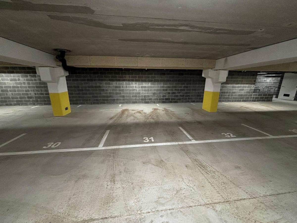 Immeuble The W : Appartement neuf 1ch près UCL avec terrasse