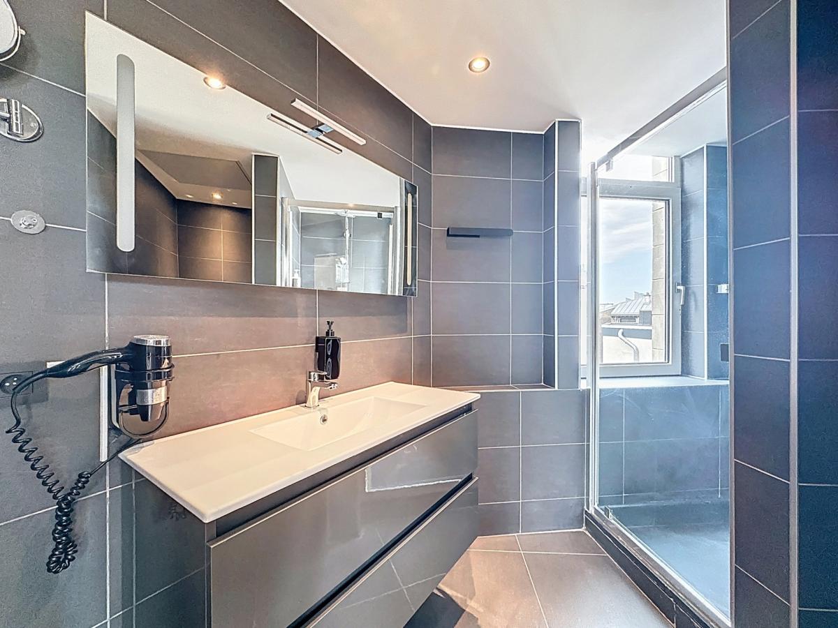 Sablon : Superbe studio avec vue sur la Place