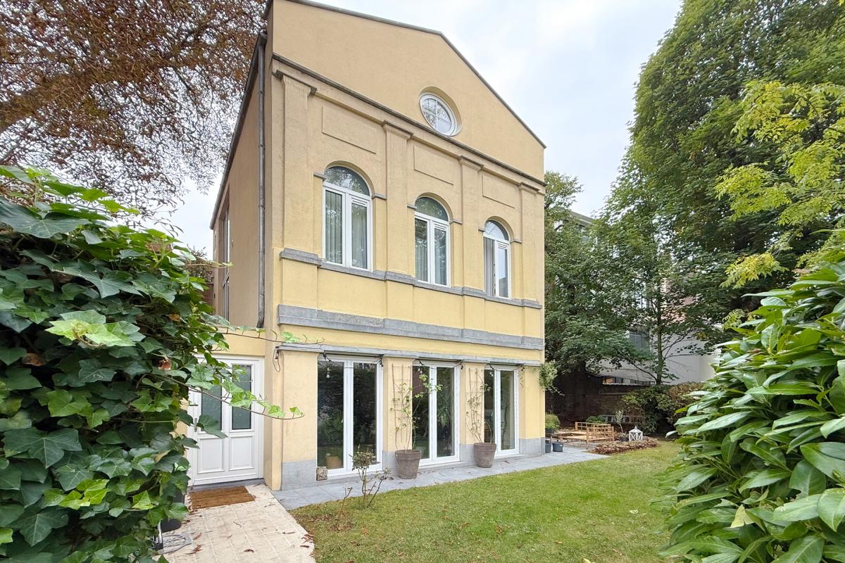 Magnifique triplex 4 CH avec jardin et parking