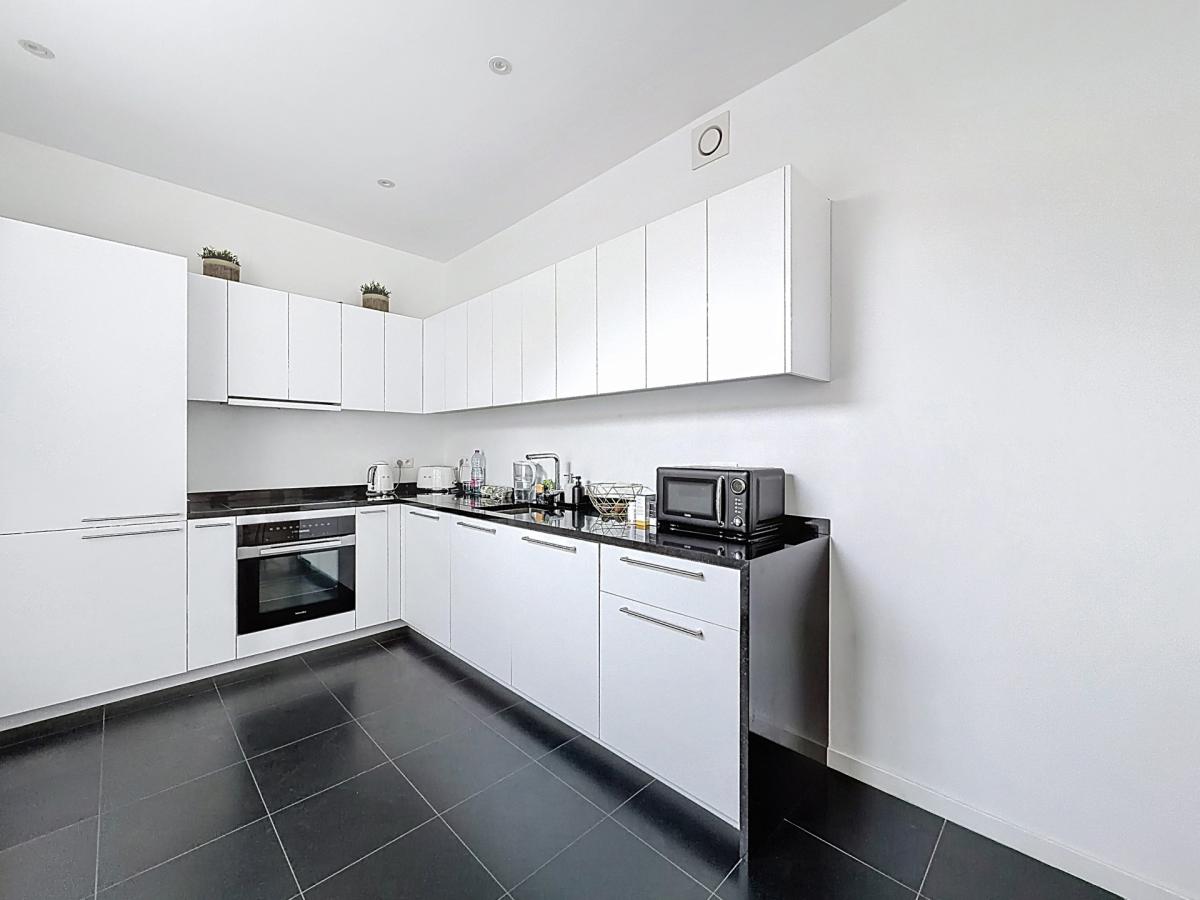 Pl. Brugmann/Lepoutre : Superbe appartement rez-de-chaussée 