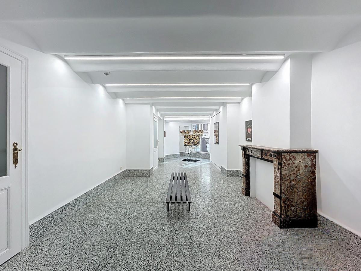 Au cœur du Sablon : Rez commercial remis à neuf