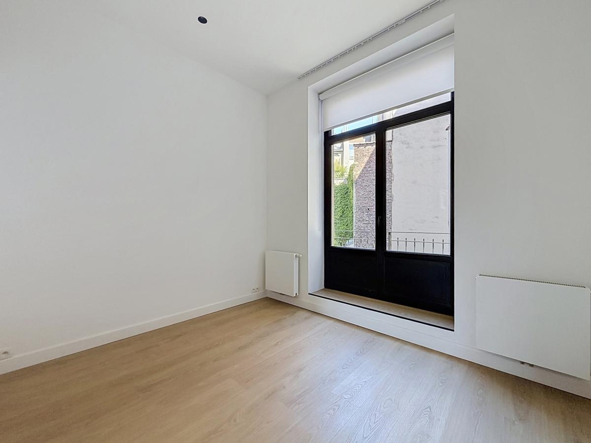 Sablon : Somptueux appartement remis à neuf + terrasse
