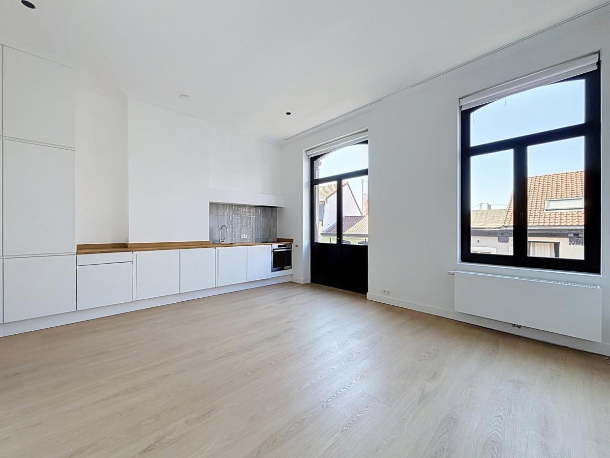 Sablon : Somptueux appartement remis à neuf + terrasse
