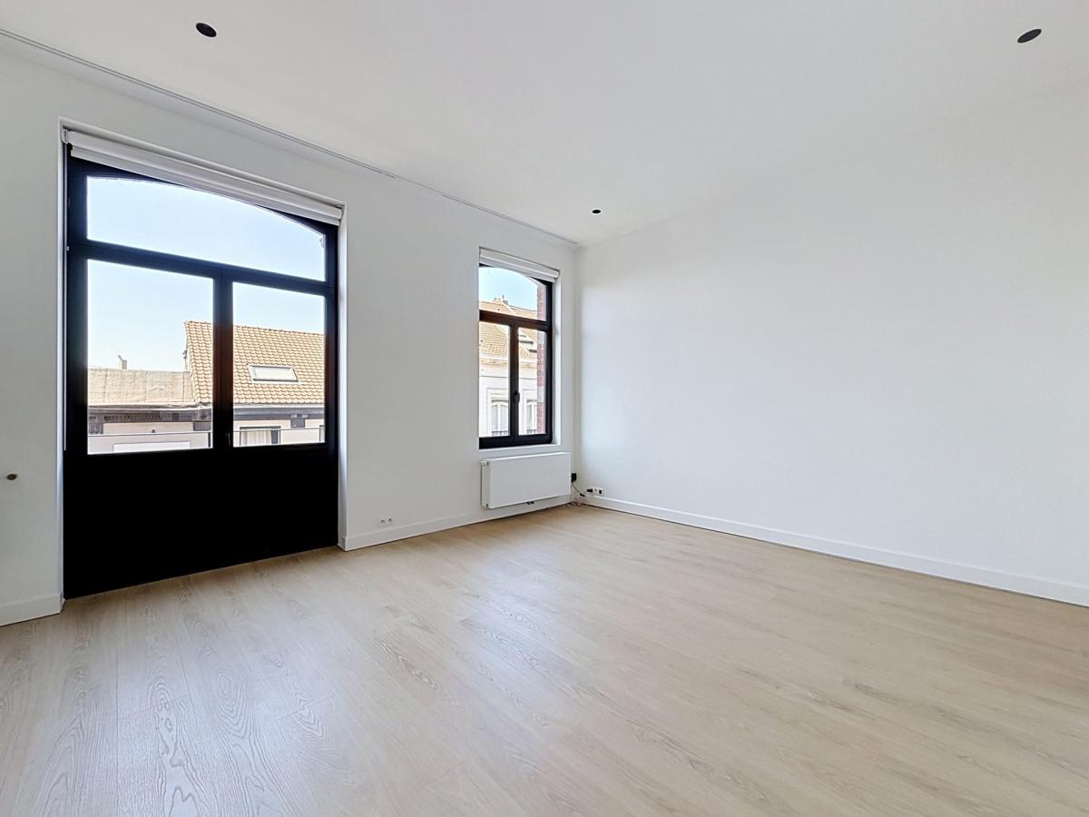 Sablon : Somptueux appartement remis à neuf + terrasse