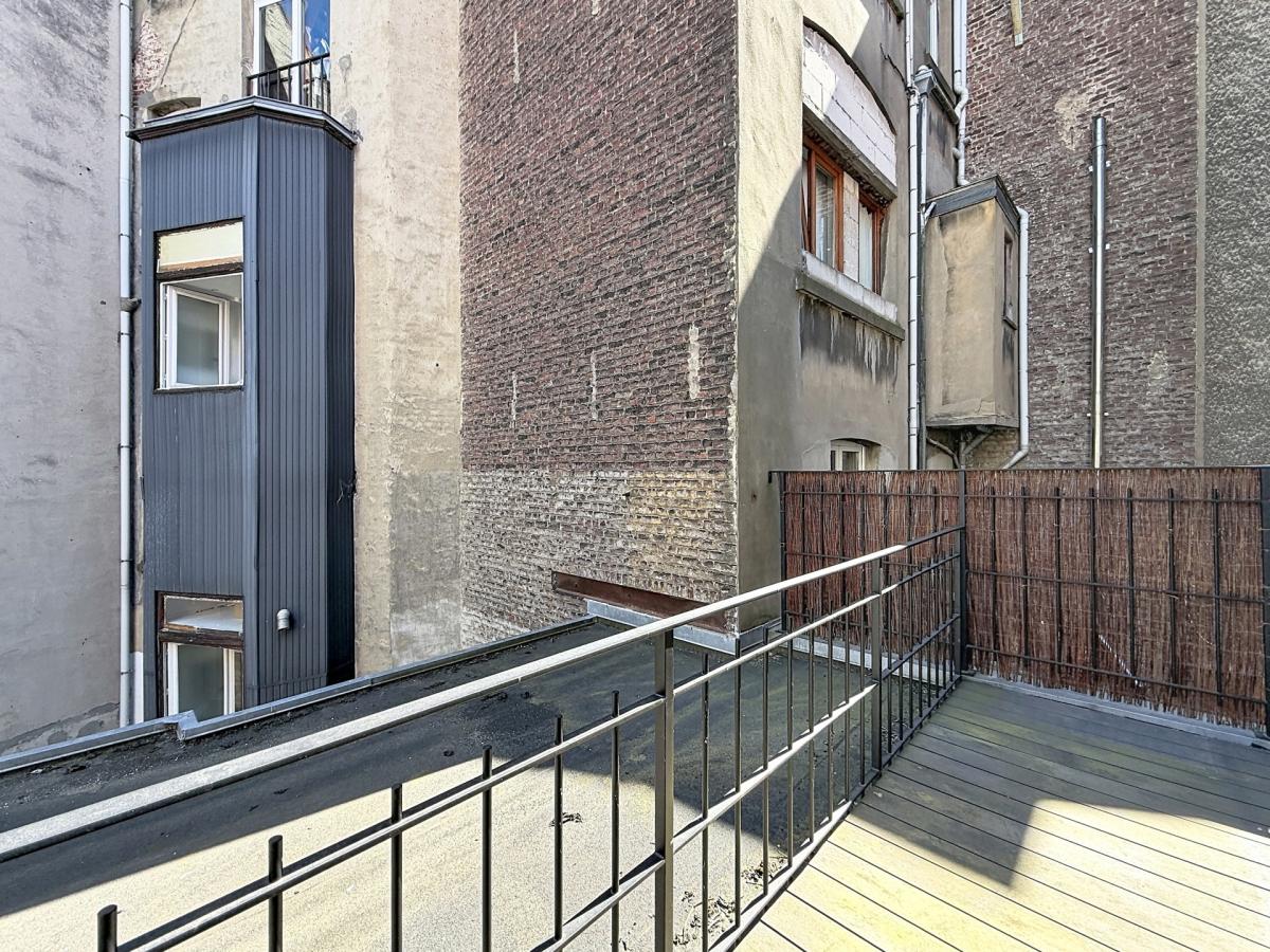 Sablon : Somptueux appartement remis à neuf + terrasse