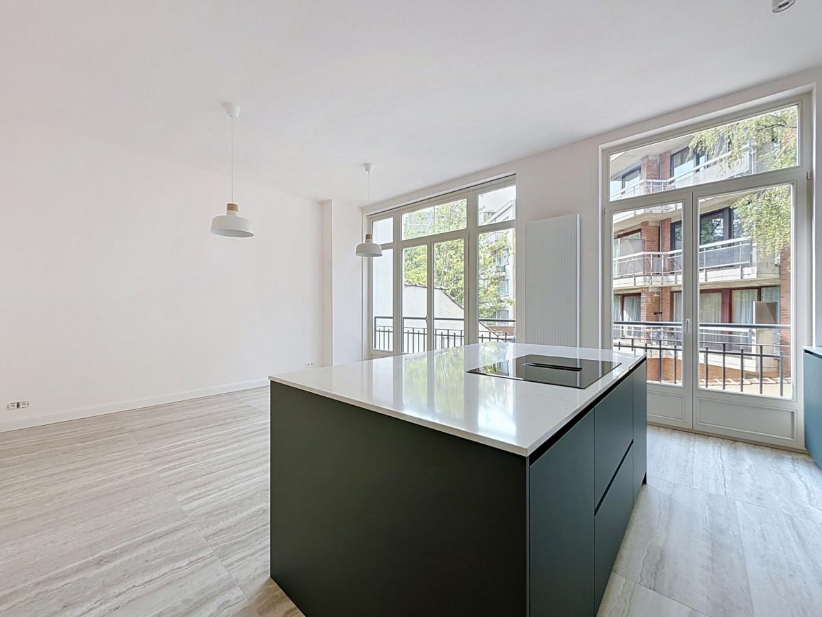 Churchill : Sublime duplex RDC avec jardin neuf