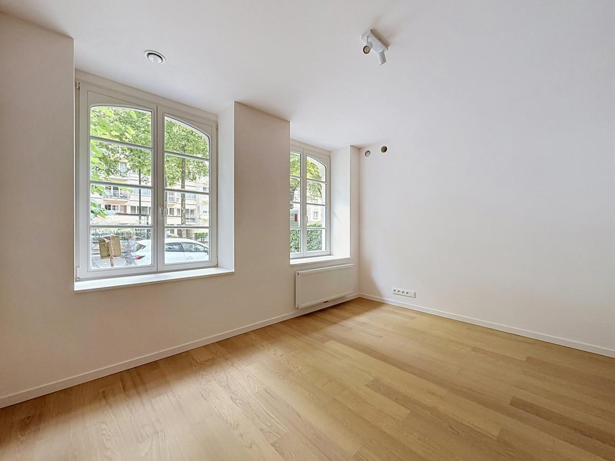 Churchill : Sublime duplex RDC avec jardin neuf