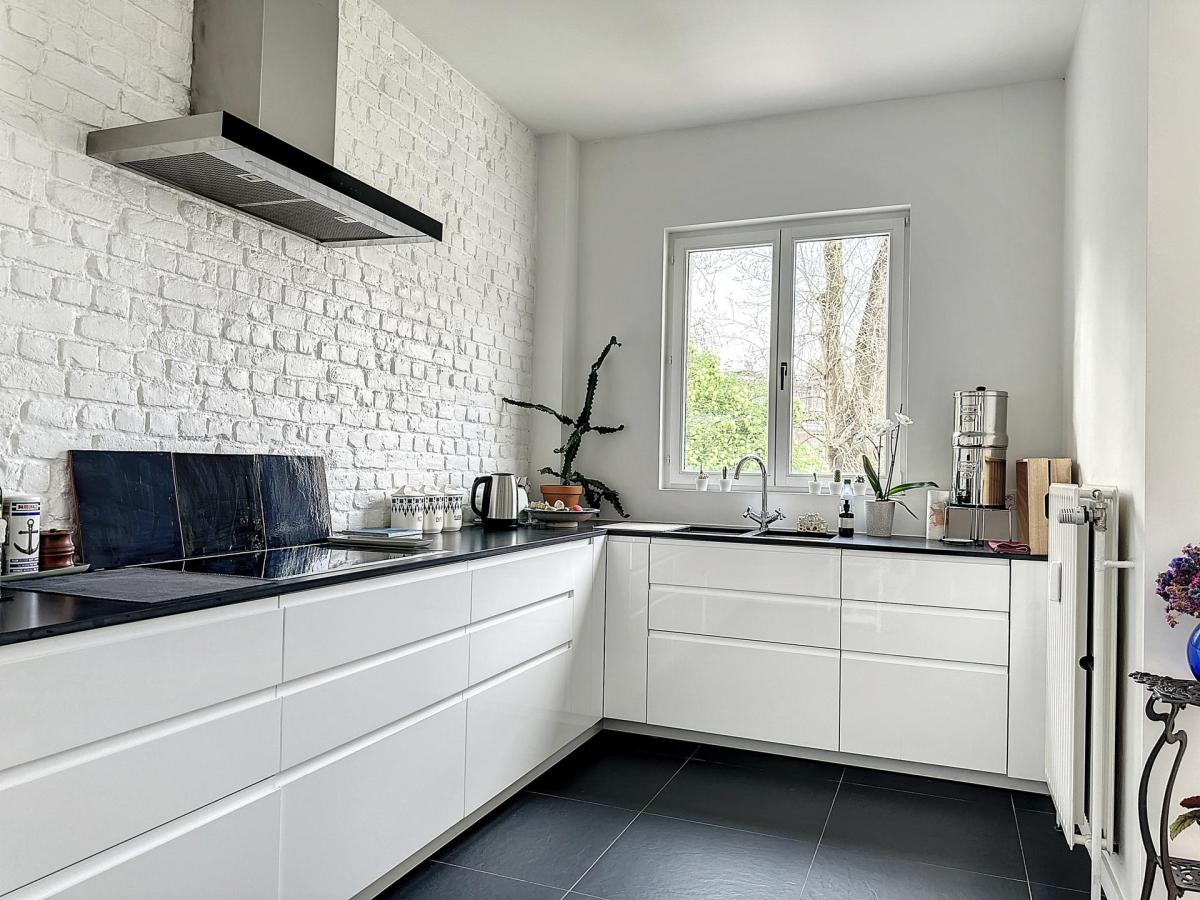 Cinquentenaire - Magnifique duplex avec jardin & garage